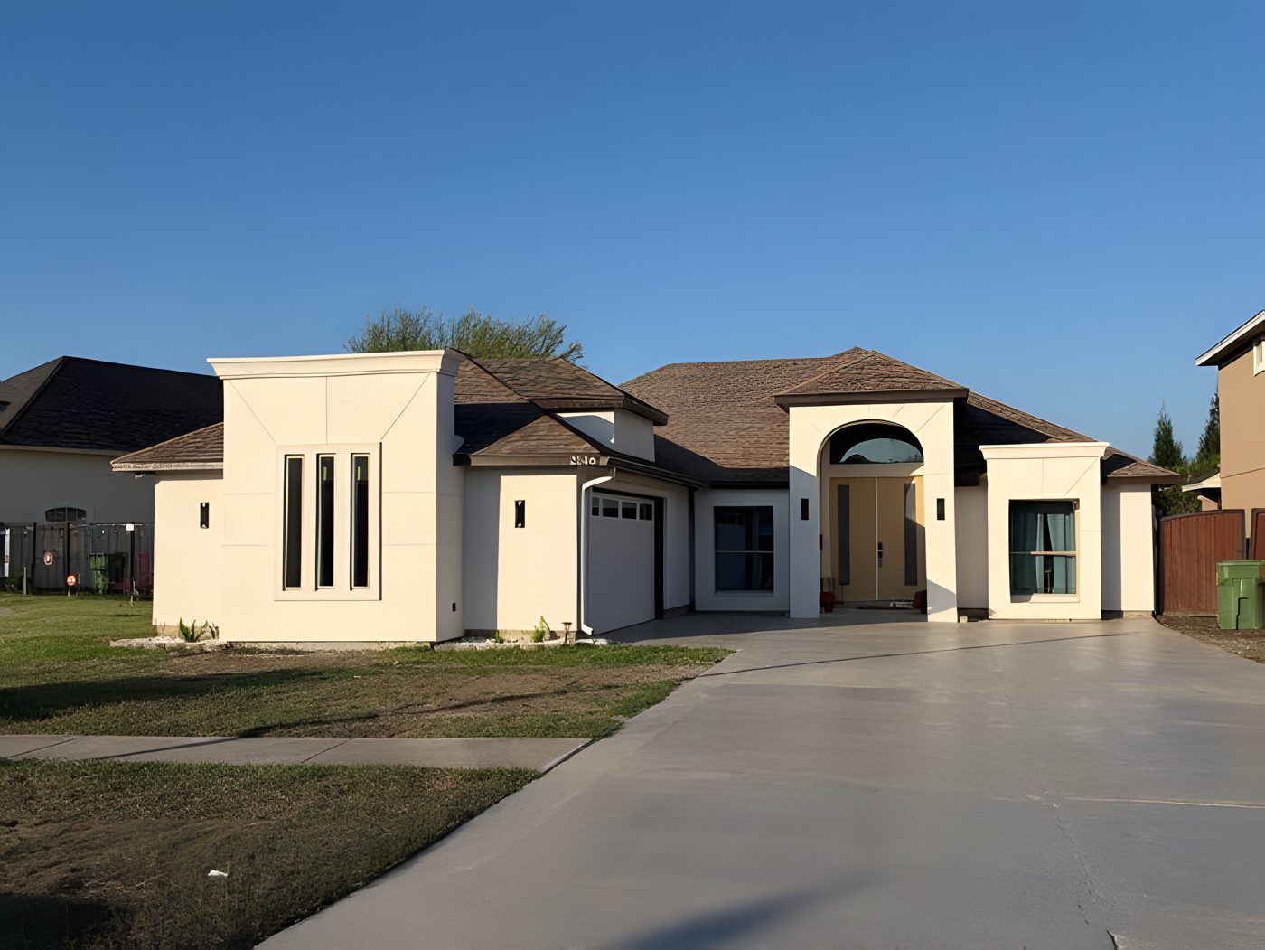 House exterior after remodel with updated stucco and modern facade